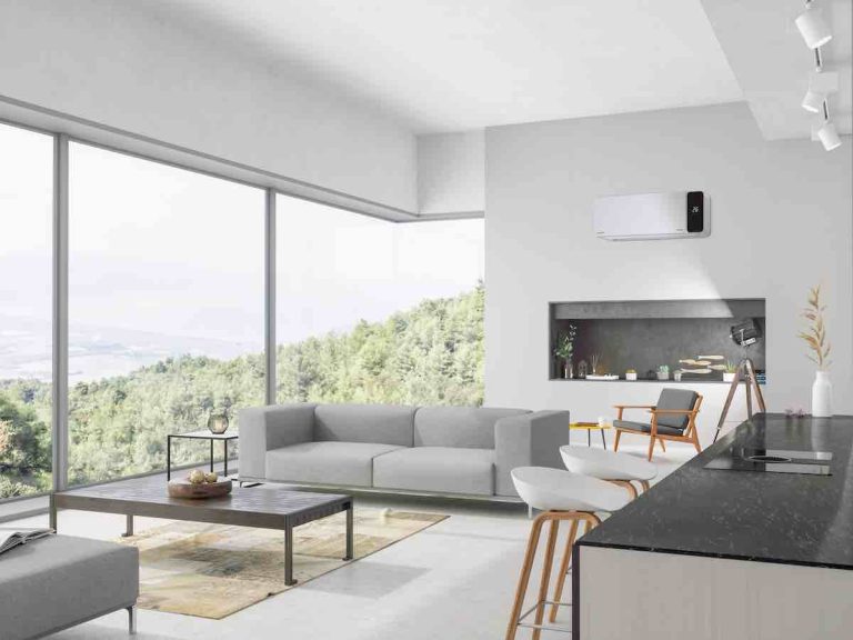 Modern living room and kitchen interior with nature view